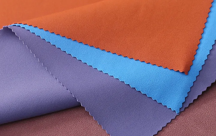 Performance knit fabrics from mill co-development, folded in four colours