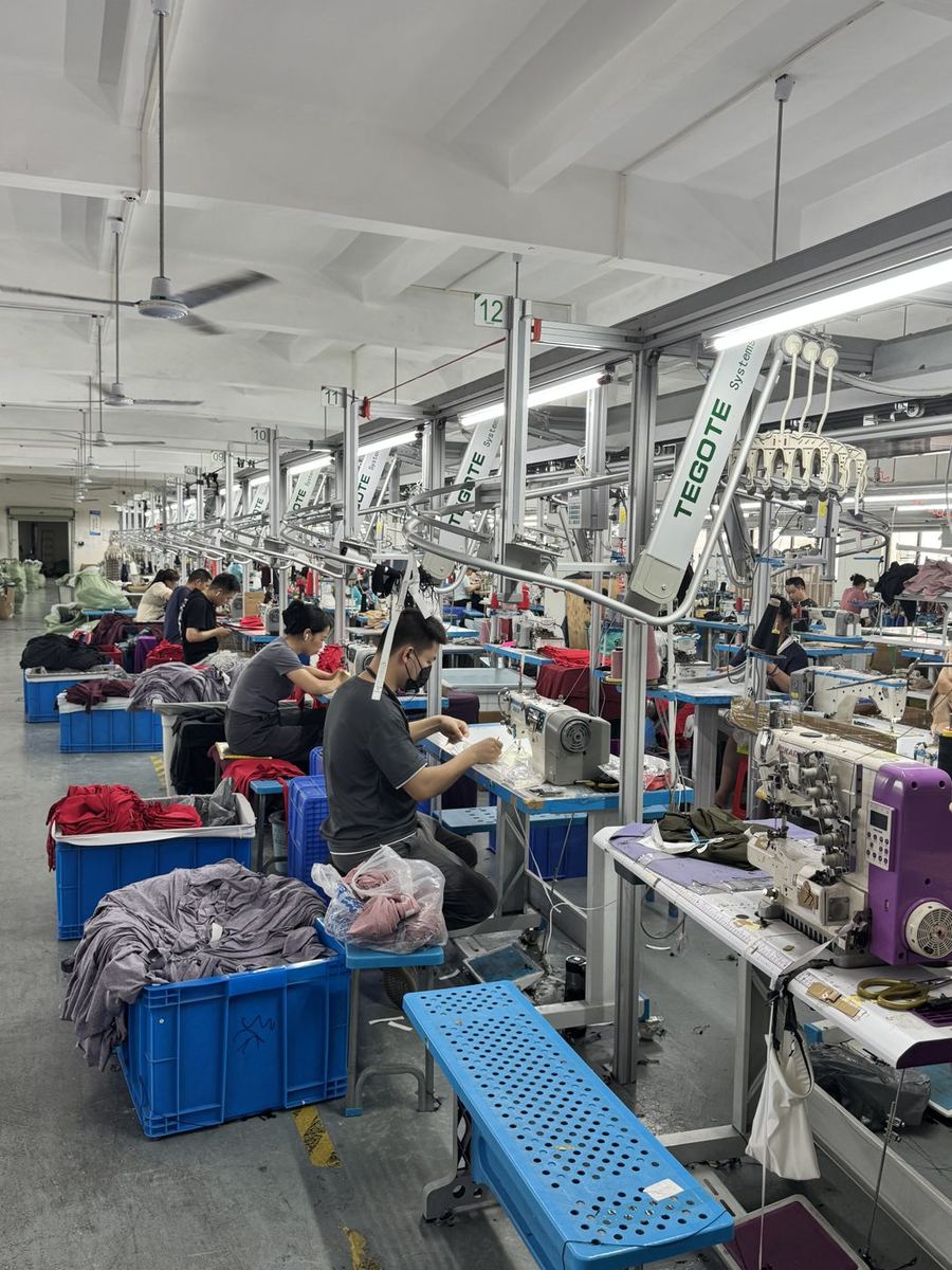 Sewing floor with intelligent hanger system